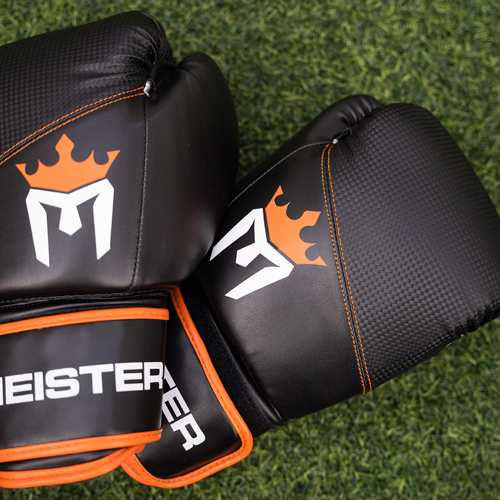 Guantes Para Boxeo Pro Meister Negro con Naranja de 14 oz (par) image 2